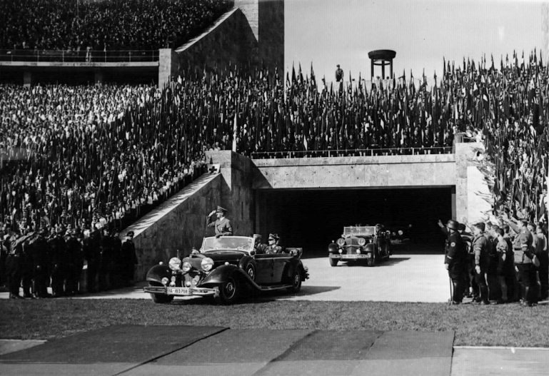 Adolf Hitler arrives in Berlin's Olympic stadium before his May Day address to the Hitlerjugend